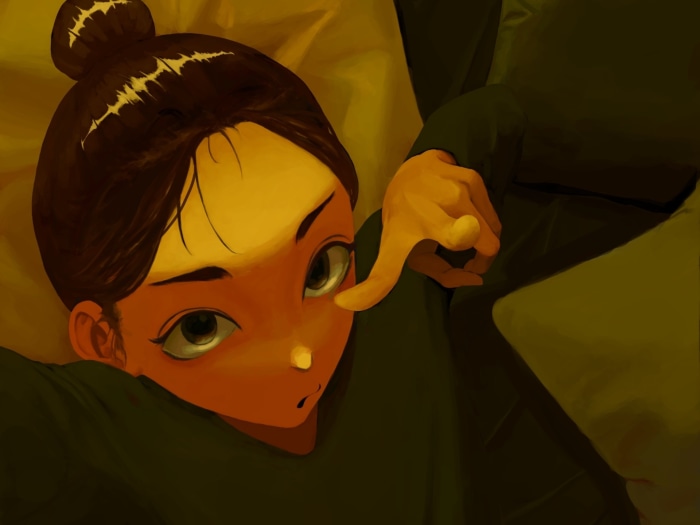 Girl with dark hair in a bun
