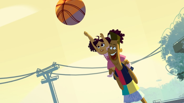 Penny Proud and Oscar Proud playing basketball