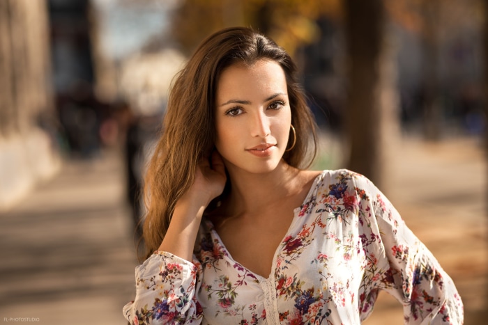 Brunette woman with floral shirt
