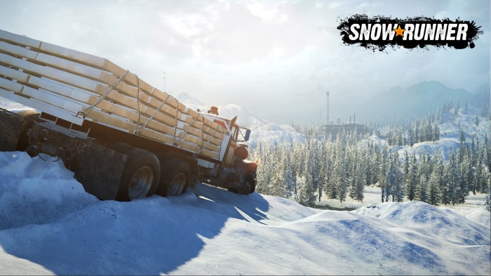 SnowRunner truck carrying lumber in snowy mountains