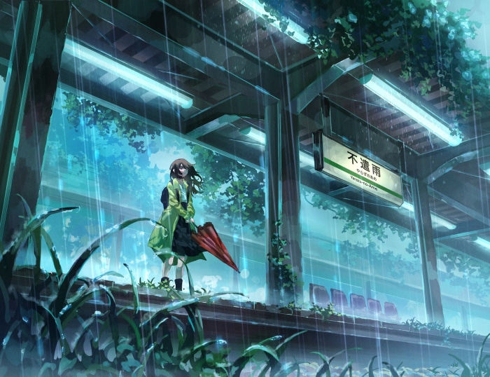 Girl at a rainy train station platform