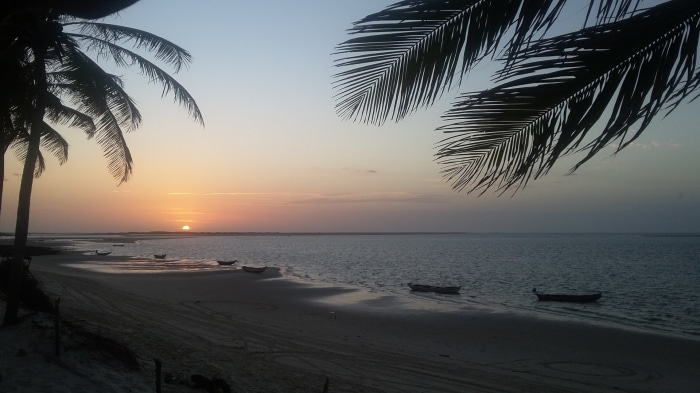 Boats on beach at sunset in Lençóis Maranhenses, Brazil