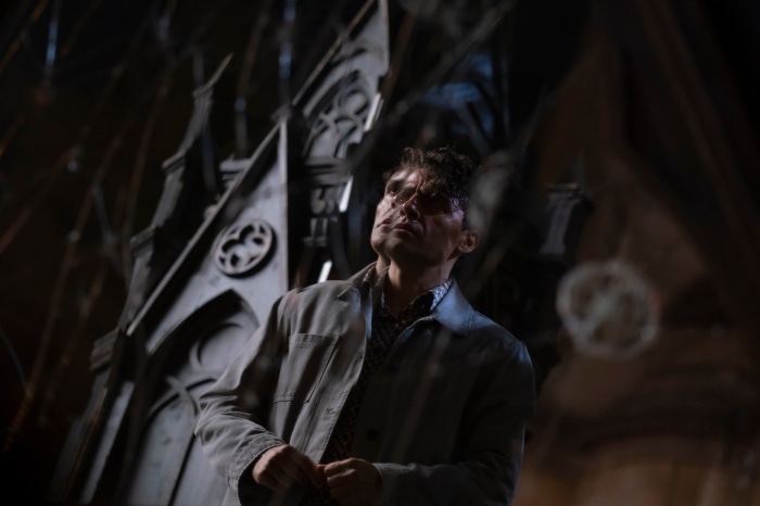Oscar Isaac as Moon Knight in a dark setting