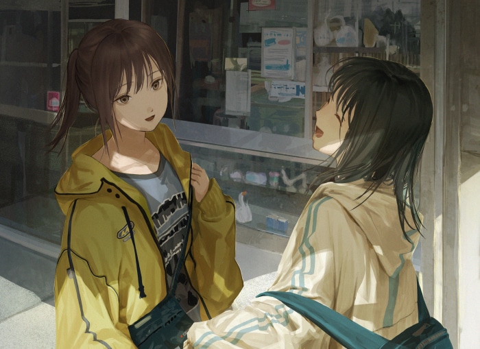 Two girls talking in front of a store