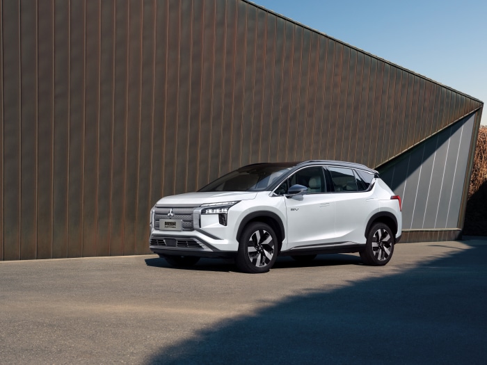 White Mitsubishi Airtrek EV parked outdoors