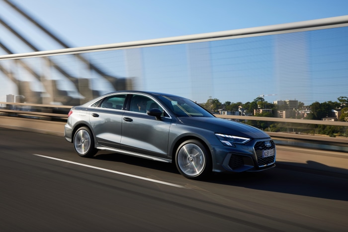 Audi A3 Sedan driving on a bridge