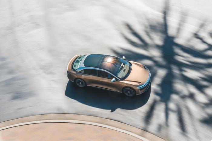 Lucid Air Dream Edition driving on a road