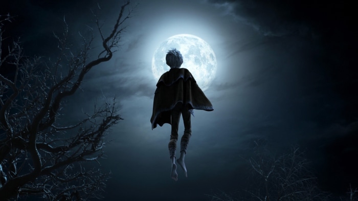 Jack Frost flying in front of the moon