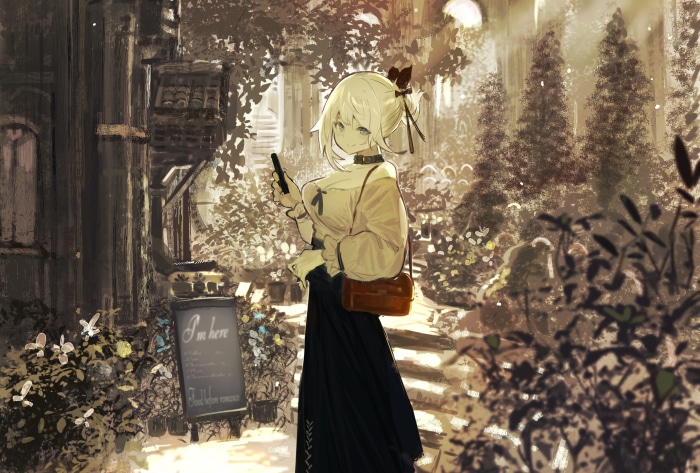Girl with a phone and a bag in a garden