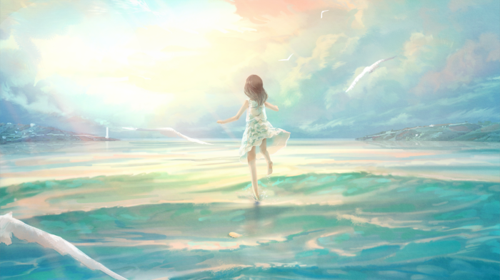 Girl in a dress running through the ocean