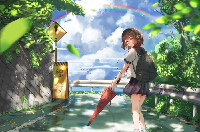 Girl with backpack and umbrella on a rainy day
