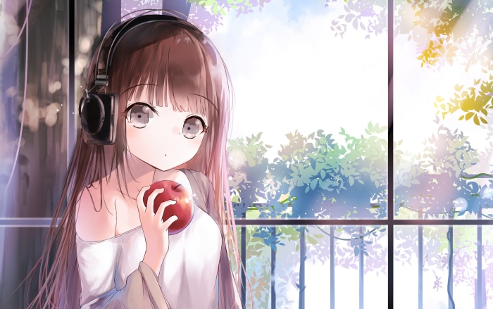 Anime girl with headphones holding an apple