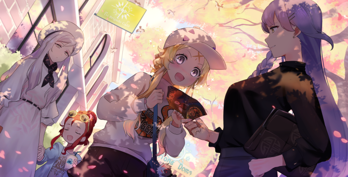 Girls with Yu-Gi-Oh! cards in a park