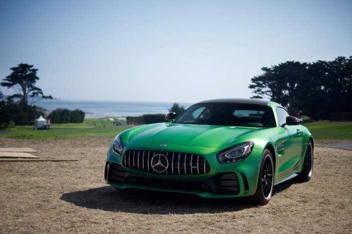 Green Mercedes-AMG GT R on a golf course