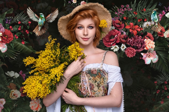 Anastasia Zhilina with mimosa flowers and birds