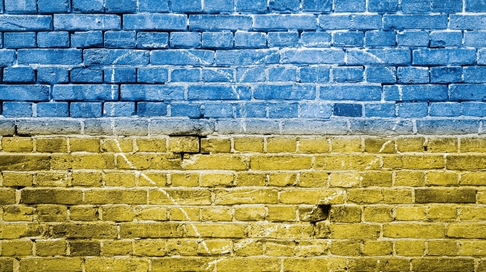 Flag of Ukraine painted on a brick wall