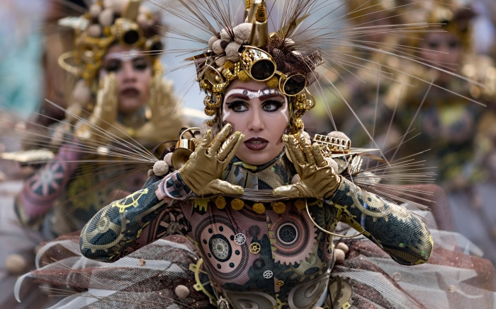 Woman in elaborate steampunk costume at carnival