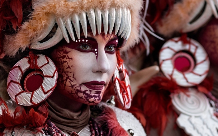 Woman in elaborate costume and face paint