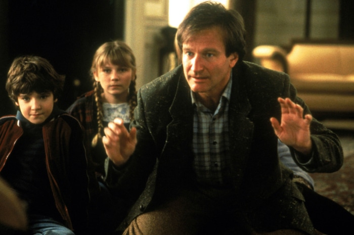 Robin Williams, Kirsten Dunst, and Bradley Pierce in Jumanji
