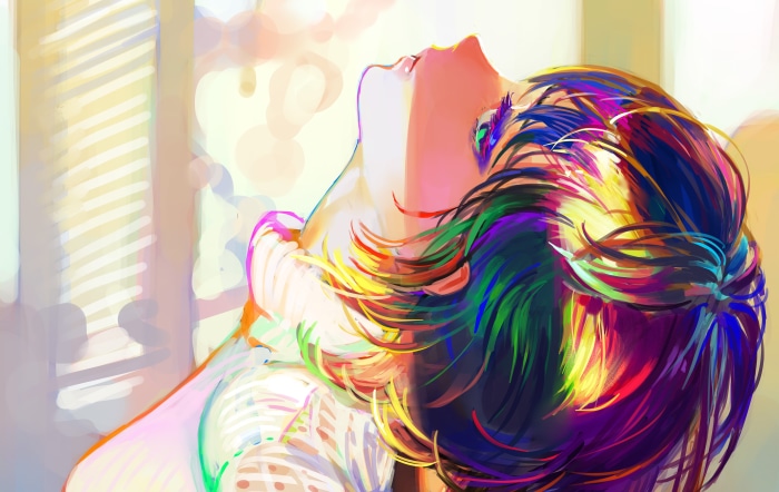 Girl with colorful hair in sunlight