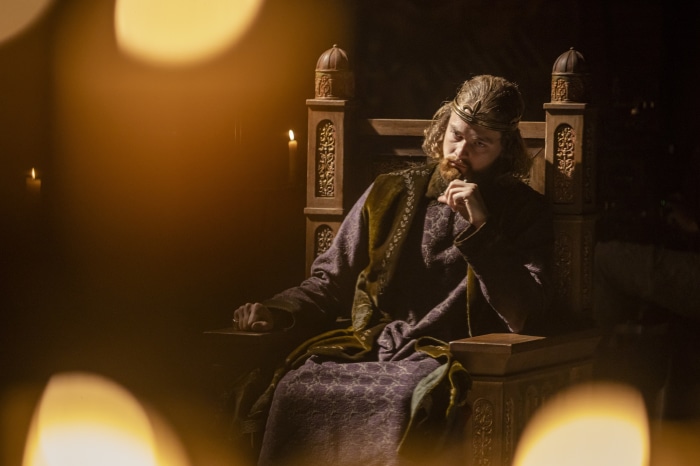 Man in crown sitting on throne in The Last Kingdom 4K