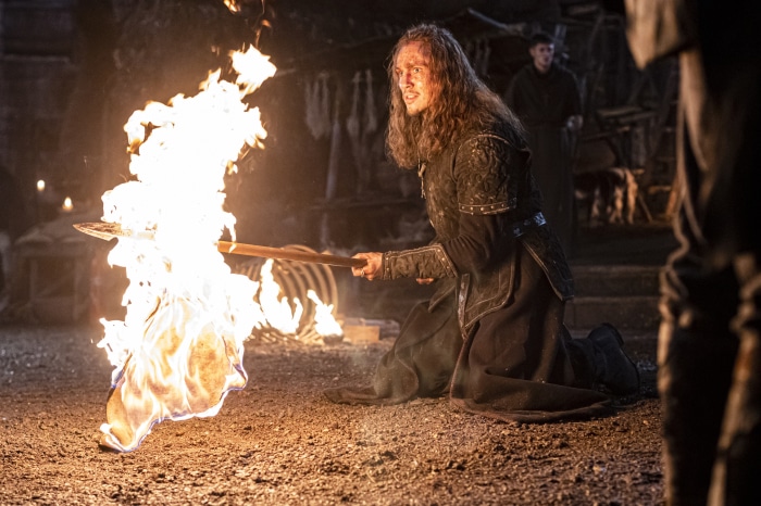 Man with flaming torch in The Last Kingdom 4K