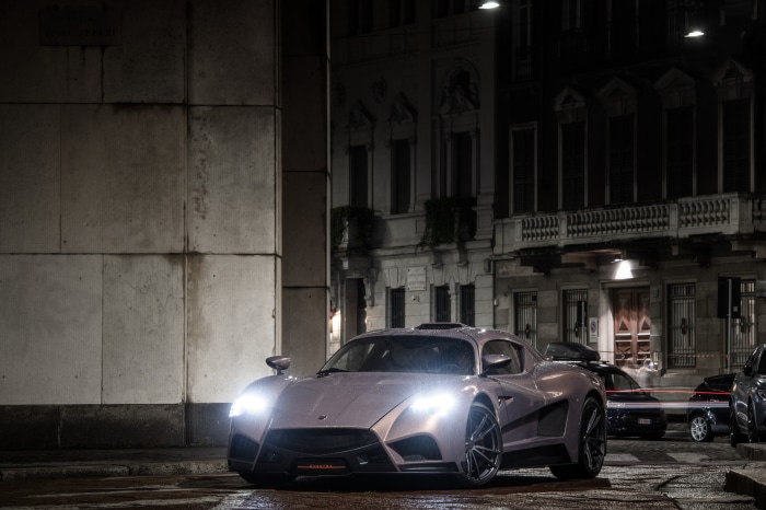 Mazzanti Evantra parked on a wet street at night