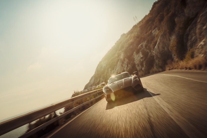 Mazzanti Evantra driving on a coastal road