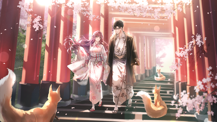 Couple walking through Fushimi Inari Shrine with foxes
