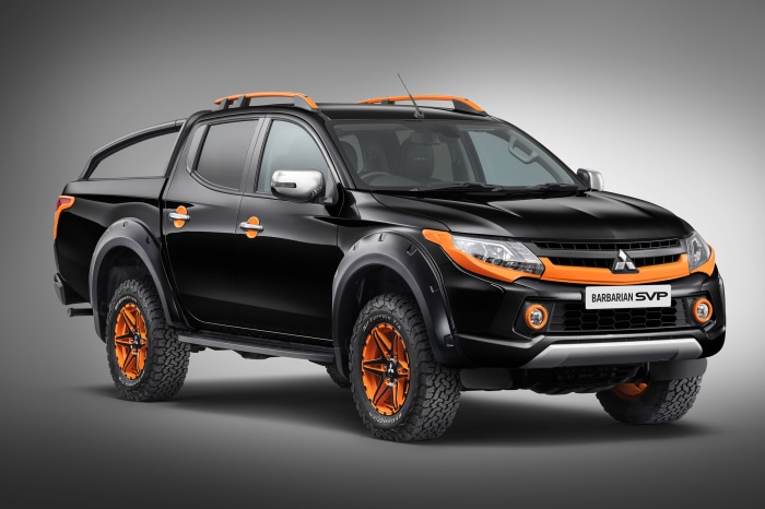 Black Mitsubishi L200 Barbarian SVP pickup truck with orange accents