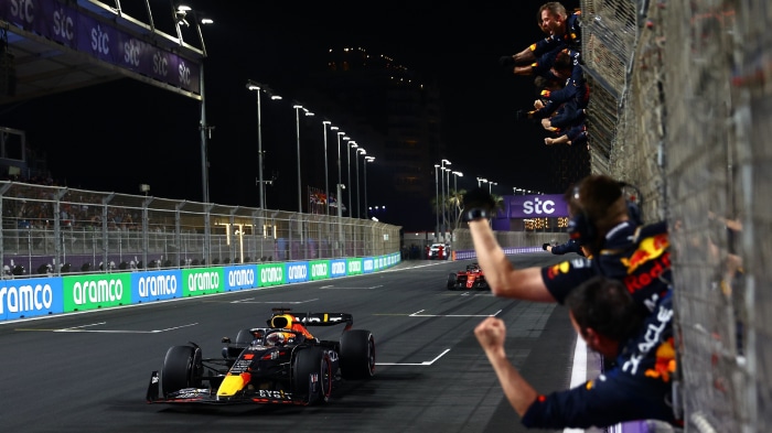 Formula 1 Red Bull Racing car on track at night