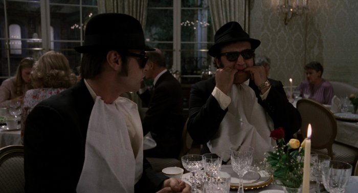 The Blues Brothers at a formal dinner