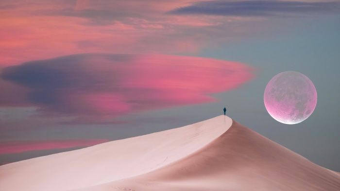 Man on Dune with Pink Moon and Clouds 4K