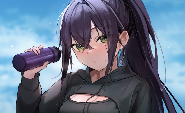 Girl drinking from a water bottle