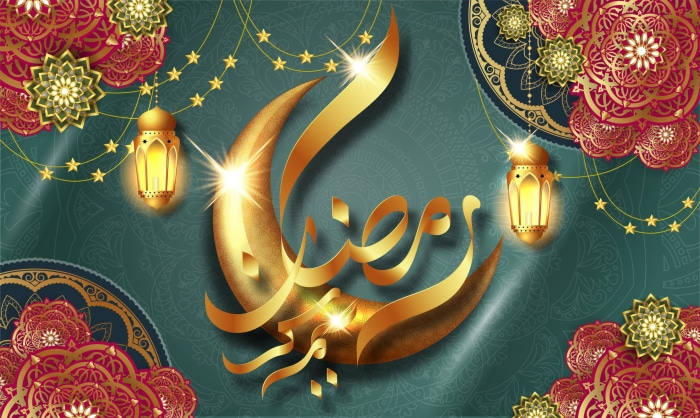 Ramadan Kareem calligraphy with crescent moon and lanterns