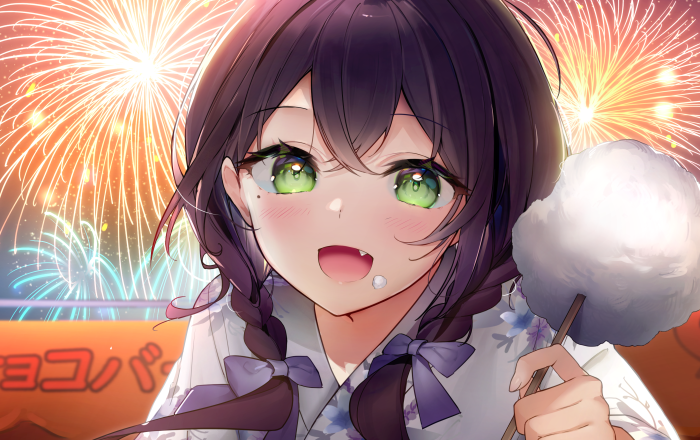 Girl with cotton candy at fireworks
