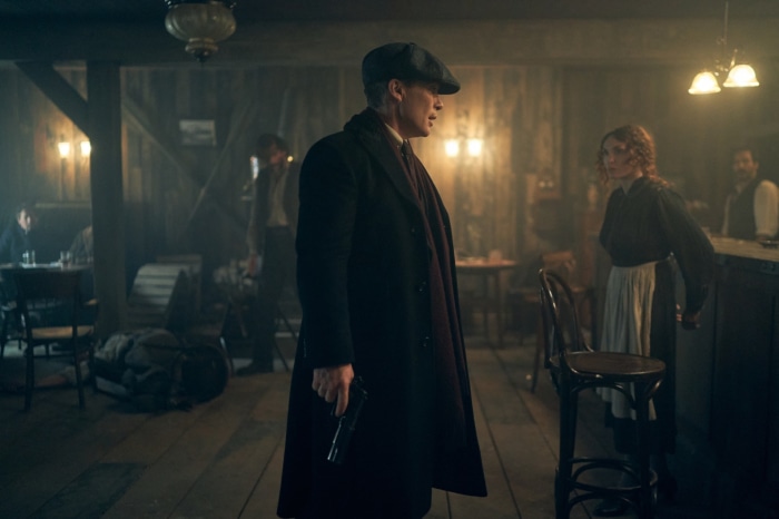 Thomas Shelby from Peaky Blinders holding a gun