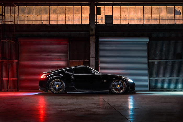 Black Nissan 370Z in a warehouse