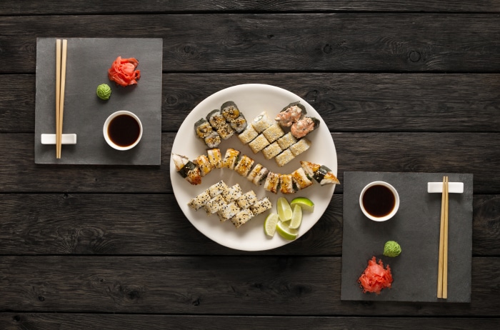 Sushi platter with soy sauce and chopsticks