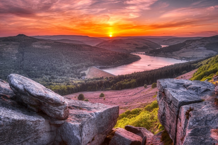 Sunset over a reservoir and valley in England