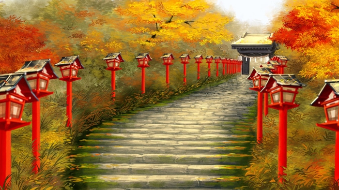 Stone stairs with red lanterns leading to a temple gate