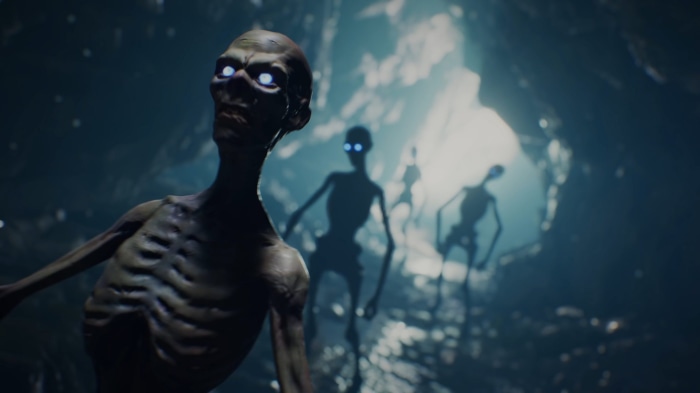 Inferius creatures with glowing eyes in a dark cave