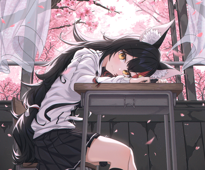 Ookami Mio from Hololive at a desk