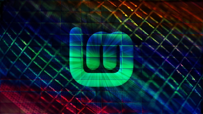 Linux Mint logo on abstract colorful background