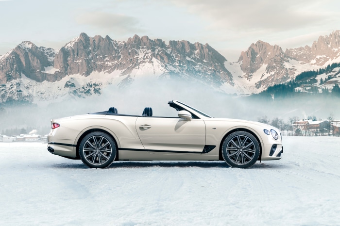 Bentley Continental GT V8 Convertible in snowy mountains 4K
