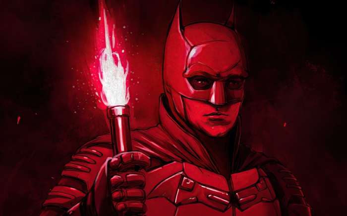 Batman holding a flaming torch