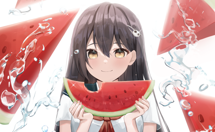 Girl holding a slice of watermelon