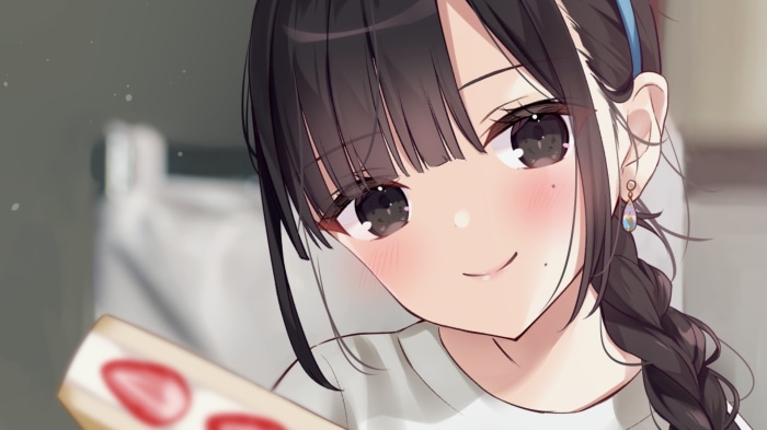 Girl holding a strawberry dessert
