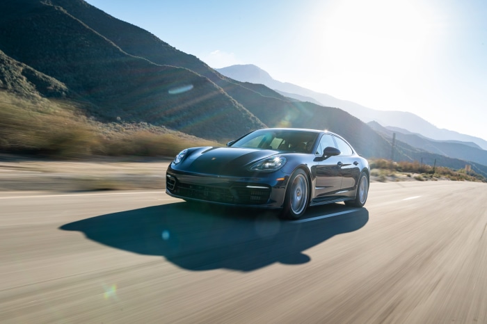 Porsche Panamera driving on a mountain road