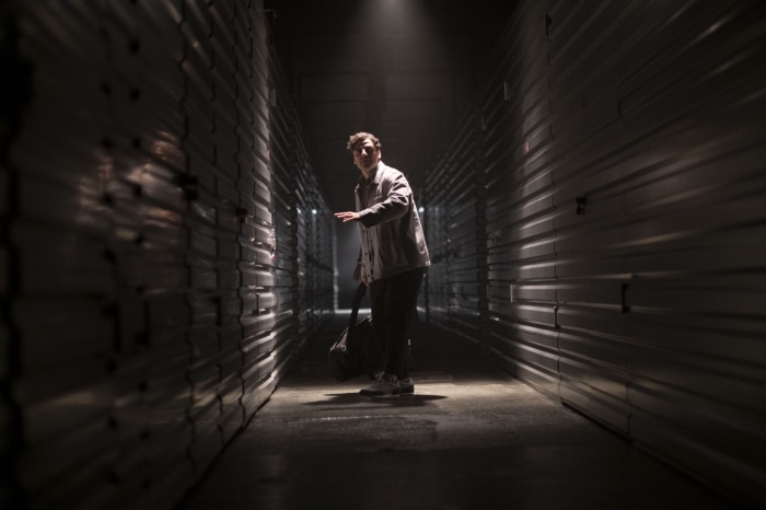 Oscar Isaac as Moon Knight in a storage unit hallway